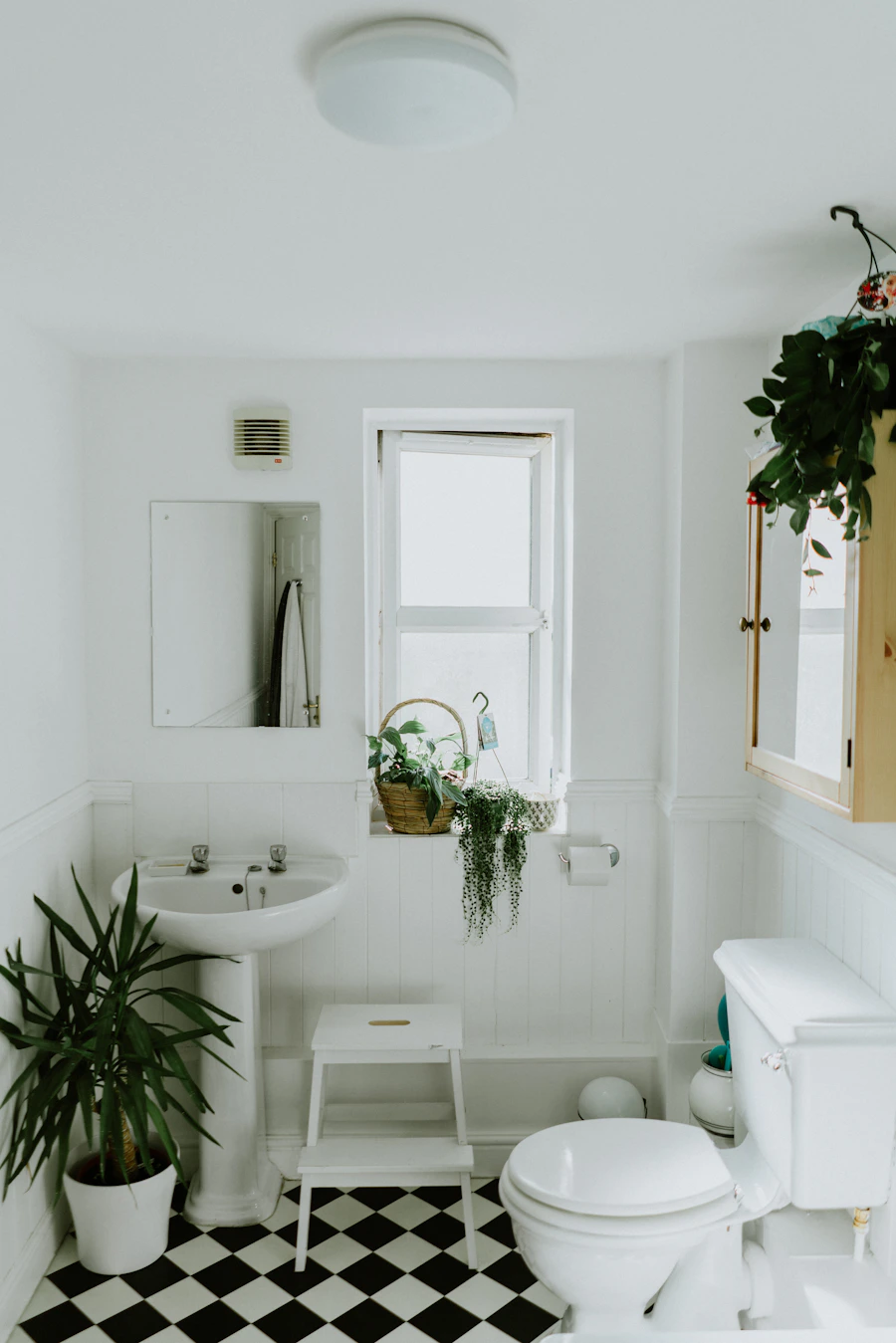 Spa-style bathroom with freestanding soaking tub and rainfall shower